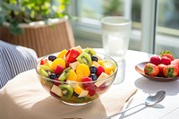 Fresh fruit salad bowl table food. 