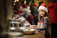 Child volunteering christmas kitchen adult. 