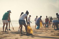 People volunteering beach outdoors nature. 