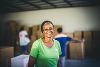 Woman volunteering cardboard adult happy. 