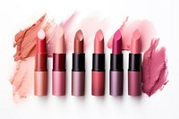 Cosmetics swatches beauty products lipstick white background arrangement variation. 