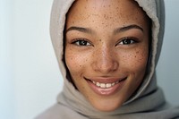 Muslim woman freckle smiling adult. 