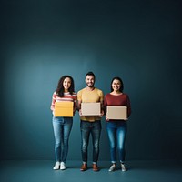 Diversity volunteers holding adult box. 