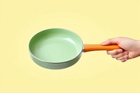 Hand hold pan throwing cookware. AI generated Image by rawpixel.