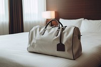 White bag furniture handbag luggage. 