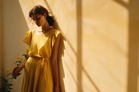 Dress fashion yellow wall. 