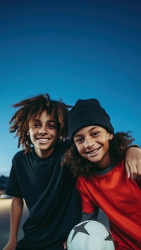 Two diversity cool kids playing sport football portrait sports. 