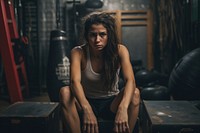 Woman boxing excercise portrait worried sitting. 