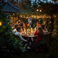 Family celebrating christmas outdoors nature party. 