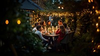 Family celebrating christmas outdoors night adult. AI generated Image by rawpixel.