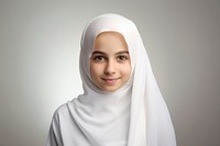 Muslim young girl portrait white smile. 