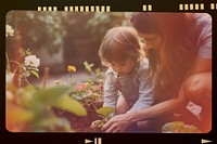 Mother and son gardening, analog film strip