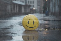 Smiling deflated balloon with folded paper effect