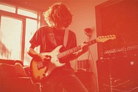 Guitarist musician with red risograph effect