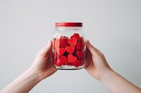 Hands giving hearts jar container freshness. 