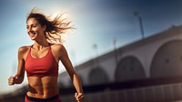 Woman running outdoors jogging sports. 