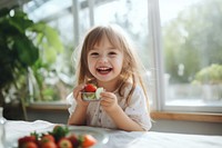 Strawberry eating child happy. AI generated Image by rawpixel.