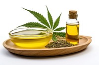 Hemp oil leaf seed white background. 