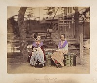 Two Japanese Women Sitting on a Bench