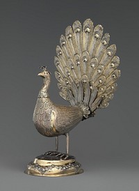 Table decoration in the form of a peacock