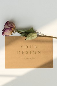 Dried pink rose with a brown card mockup