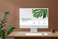 Computer screen mockup psd on a desk in a retro home office