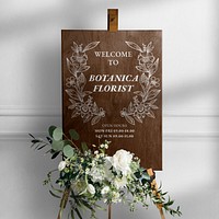 Wedding sign mockup, wooden board, white flower design psd