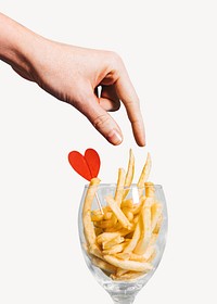 Hand picking fries from cup, isolated image