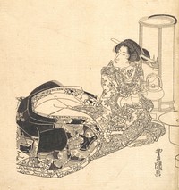 Courtesan or Actor as Courtesan Pouring Tea by the Light of a Lantern by Utagawa Toyokuni