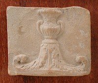 Plaque with a Capital