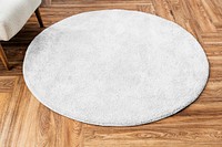 Round rug mockup psd on wooden floor