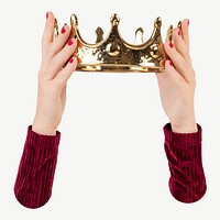 Hand holding gold crown psd