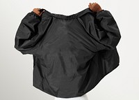 Large black jacket mockup on a black model