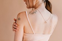 Floral tattoos on woman's shoulder
