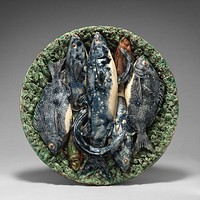 Round dish with moss and fish