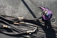 U.S. Navy Aviation Boatswain's Mate (Fuels) Airman Chelsey Fucito gathers a fuel hose on the flight deck of the aircraft carrier USS Harry S. Truman (CVN 75) in the Gulf of Oman Feb. 21, 2014.