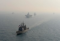 The guided missile cruiser USS Lake Erie (CG 70), front, transits the East China Sea with ships assigned to the Bonhomme Richard Amphibious Ready Group and Republic of Korea Navy ships during a photo exercise March 27, 2014.