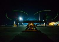 Crew members conduct final inspections on a U.S. Marine Corps MV-22B Osprey tiltrotor aircraft assigned to Special Purpose Marine Air-Ground Task Force Crisis Response July 26, 2014, before it takes off from Naval Air Station Sigonella, Italy, to provide support to a military-assisted departure from the U.S. Embassy in Tripoli, Libya.