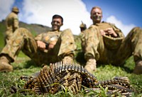 Australian soldiers with Delta Company, 5th Battalion, Royal Australian Regiment wait to finish off the last of their 7.62 mm rounds after a tactical live-fire demonstration during the Rim of the Pacific (RIMPAC) 2014 exercise July 29, 2014, at a range at Marine Corps Base Hawaii in Kaneohe, Hawaii.