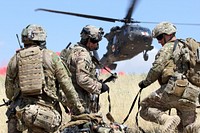U.S Army Soldiers assigned to Task Force Leader, 3rd BCT, 101st Airborne Division evacuate a simulated casualty during a combined arms live-fire training exercise in Laghman province, Afghanistan, May 13, 2015.