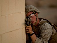 U.S. Navy, HN Grady Seibert with 2nd Battalion, 7th Marine Regiment, 1st Marine Division, posts security during a Heavy Huey Raid at K-9 Village, Yuma Proving Grounds, Ariz., Oct. 7, 2015.