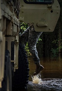 Flood water from the Edisto River quickly rose during high tide, while South Carolina National Guard Soldiers helped residents protect their property Oct. 9, 2015 in Parkers Ferry, S.C. The historic flooding, which has caused damage, destruction and death throughout South Carolina, has been the result of record-setting rainfall during what is being considered a 1,000-year event delivered by Hurricane Joaquin as it traveled up the East Coast.