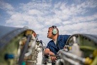 Tech. Sgt. Carlo Patalinghug, 455th Expeditionary Aircraft Maintenance Squadron crew chief, deployed from Hill Air Force Base, Utah, examines an F-16 Fighting Falcon to isolate and repair a hydraulic leak at Bagram Air Field, Afghanistan, Nov. 30, 2015.