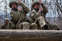 British Officer Cadets Perry Jolly and Samuel Camp, both assigned to the Royal Military Academy Sandhurst located in Camberley, United Kingdom, practice maneuvering a rope swing prior to the Sandhurst competition at the United States Military Academy at West Point, N.Y., April 6, 2016.