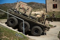 A Multi-Utility Tactical Transport (MUTT) demonstrates its capabilities in a simulated terrain setting during the Advanced Naval Technologies Exercise 18 (ANTX18) on Camp Pendleton, Calif., March 19, 2018.