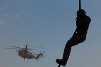 U.S. Marines with 2nd Battalion, 3rd Marine Regiment, 3rd Marine Division conduct a fast rope exercise out of a CH-53E Super Stallion at Auxiliary Airfield 2, Yuma, Ariz., Sept. 30, 2016.