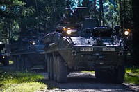 U.S. Soldiers, assigned to the Regimental Engineer Squadron, 2nd Cavalry Regiment, move their Stryker vehicles towards to range to prepare for the live fire portion of the Selectable Lightweight Attack Munition (SLAM) demonstration at the Grafenwoehr Training Area, Germany, Aug. 25,2016. SLAM is a multipurpose munition designed to be readily portable and hand-emplaced against lightly armored infantry vehicles, parked aircraft and petroleum storage sites.