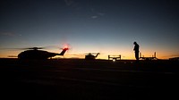 U.S. Marine Corps CH-53E Super Stallions and a MV-22B Osprey assigned to Marine Aviation Weapons and Tactics Squadron One (MAWTS-1) taxi down a runway during FINEX 1 in support of Weapons and Tactics Instructor course (WTI)1-17 at SELF, Marine Corps Air Ground Combat Center Twentynine Palms, Calif., Oct. 18, 2016.