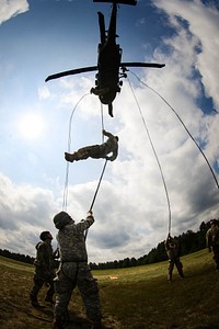 Students from the DeGlopper Air Assault School, VXIII Airborne Corps, rappel from an UH-60M Black Hawk Helicopter assigned to 2nd Assault Helicopter Battalion, 82nd Combat Aviation Brigade, 82nd Airborne Division, Fort Bragg, N.C., Sept. 28, 2016.