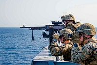 170304-N-JH293-292 EAST CHINA SEA (March 4, 2017) Marines assigned to Battalion Landing Team 2nd Battalion, 5th Marines, participate in a defense of the amphibious task force (DATF) gunnery exercise aboard the amphibious transport dock ship USS Green Bay (LPD 20).